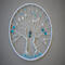 front view 6 inch silver wire tree adorned with blue and clear glass beads featuring blue owl charm swaying between two trees